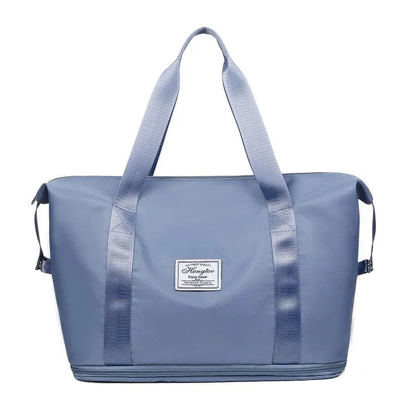 High capacity double layer suitcase for wet separation