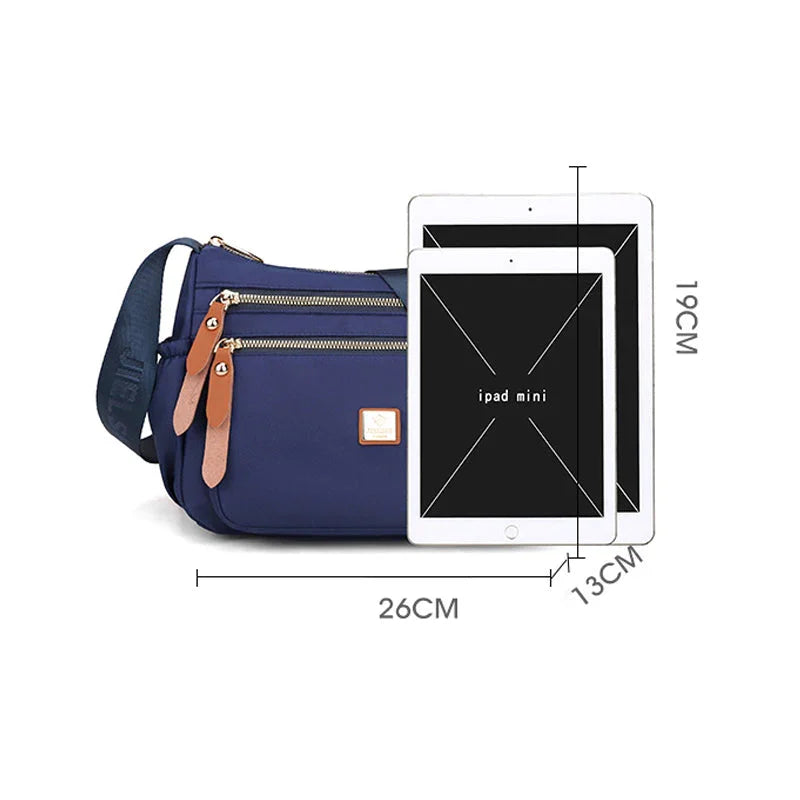 Shoulder strap bag with multiple compartments